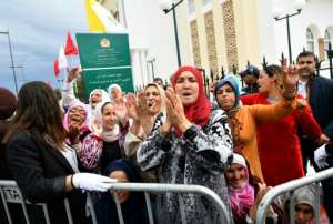Thousands of Moroccans greeted Pope Francis in the capital Rabat. By Alberto PIZZOLI (AFP)