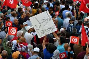 Thousands of Tunisians protested against the president's ongoing power grab on Sunday. By FETHI BELAID (AFP)