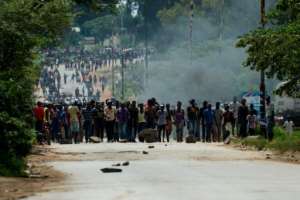 The country suffers daily shortages of banknotes, fuel, food and medicine. By Jekesai NJIKIZANA (AFP/File)