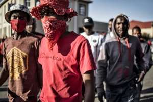 The court hearing drew supporters of Julius Malema, who said they just wanted equality. By MARCO LONGARI (AFP)