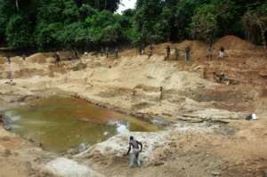 The CAR's mineral wealth ranges from copper and iron ore to gold and uranium. Pictured: A diamond mine at Banengbele in southwestern CAR, in 2015. By Patrick FORT (AFP)