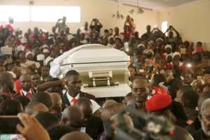 The casket of late opposition leader Morgan Tsvangirai is carried into Mabelreign Methodist Church in Harare for a memorial service.