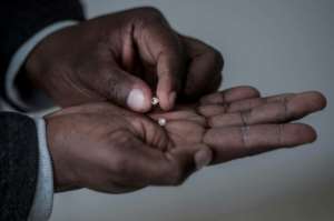 The choice of Kimberley for the small-scale diamond mining pilot is highly symbolic as the hub of the country's mining sector and where gem giant De Beers was founded in 1888 by British colonialist Cecil Rhodes. By MUJAHID SAFODIEN (AFP)