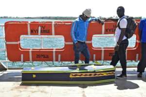 The ageing vessel, whose hull and propellers were all that remained visible after it overturned, was also carrying cargo, including sacks of maize, bananas and cement. By ANDREW KASUKU (AFP)