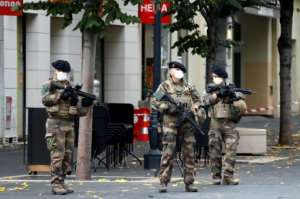 The assailant, who was shot and wounded by police, was identified as 21 year-old Brahim Aouissaoui, who arrived in Italy last month, then travelled to France, judicial sources said. By ERIC GAILLARD (POOL/AFP)
