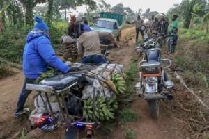 The giant bikes are able to transport goods and people to remote villages on tracks that are almost impossible for cars and trucks. By Daniel Beloumou Olomo (AFP)