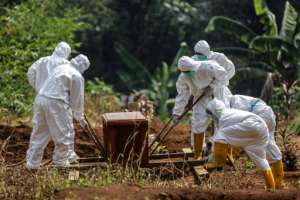 The global death toll from the coronavirus pandemic has topped 900,000 since the respiratory disease first appeared in China last year. By ADITYA AJI (AFP/File)