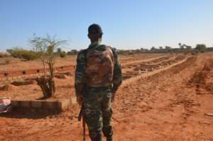 The graves of 71 troops killed in an attack in Niger at the end of 2019. By Boureima HAMA (AFP/File)