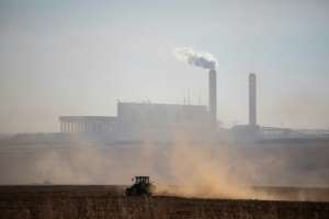 The economic outlook is clouded by power outages. By Wikus DE WET (AFP/File)