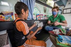 The Egyptian state's 'Atfal bala ma'wa' (Children Without a Home) programme deploys 17 mobile units throughout the country, providing a place to rest, food and games as well as medical, social and psychological support to street children. By Khaled DESOUKI (AFP)