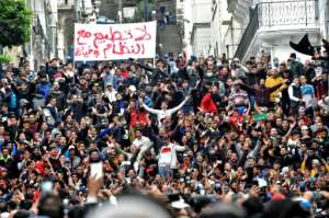 The Hirak anti-government movement continued after Bouteflika's ousting. By RYAD KRAMDI (AFP)