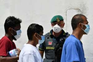 The interior ministry has said the army would guard reception centres to prevent migrants from escaping mandatory quarantine. By Alberto PIZZOLI (AFP)