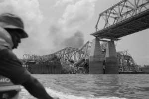 The Onitsha bridge, one of the most important communication pathways of West Africa, is destroyed by the Biafran forces. By Colin HAYNES (AFP/File)