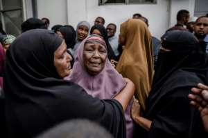 The loved ones of victims are in mourning after 21 people were killed in an Islamist attack claimed by the Al-Qaeda-linked Somali group Al-Shabaab.  By Luis TATO (AFP/File)