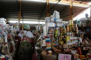 The market stalls are laden with grilled fish and meat cuts, household goods and clothes, while many offer cell phone repairs. Yet customers are scarce. By Sofia Christensen (AFP)