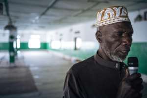 The muezzin at the Katindo mosque in Goma, northeastern DR Congo, called for prayers in a deserted house of worship on Sunday after the authorities appealed for social distancing. By ALEXIS HUGUET (AFP)
