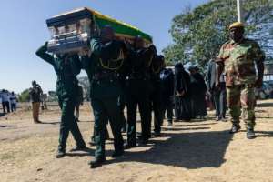 The Mugabe family opted to bury Zimbabwe's founding father in Kutama after disputing with the government. By Jekesai NJIKIZANA (AFP)
