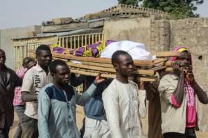 The northeast region of Borno sees regular attacks on civilians and on Tuesday people at Sajeri villagers buried the victims of the last attack. By Audu MARTE (AFP)