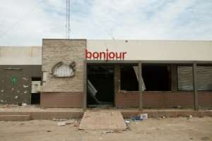 The new military junta warned against acts of vandalism after some buildings were torched. By ANNIE RISEMBERG (AFP)