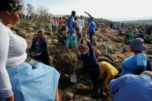 The scene at KwaHlathi village on Tuesday. By Phill Magakoe (AFP)