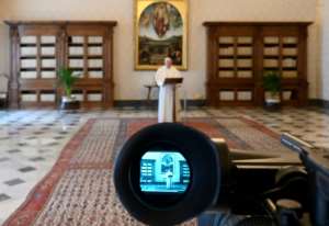 The pope delivered his Easter addresses via video livestream, a first for the pontiff. By Handout (VATICAN MEDIA/AFP)