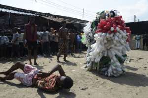 The professional dancers hope the performances and courses they run slowly change the district. By PIUS UTOMI EKPEI (AFP)