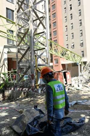 The project to build a 14-storey student hostel was being supervised by a Chinese construction firm. By Simon MAINA (AFP)