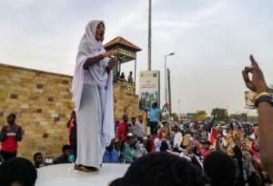 The protest movement's 'Nubian queen', Alaa Salah, has been propelled to internet fame after clips went viral of her leading chants against President Omar al-Bashir. By - (AFP)