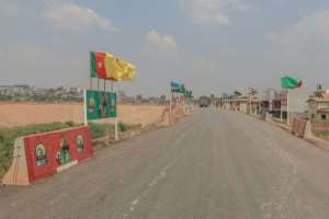 The roads are quiet as the African Nations Championship flags flutter in the breeze. By Daniel BELOUMOU OLOMO (AFP)