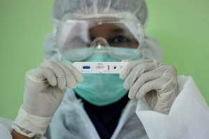 The race is on around the world to develop one, with the University of Oxford launching a human trial for a potential vaccine. By CHAIDEER MAHYUDDIN (AFP)
