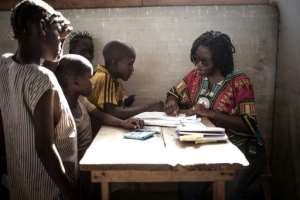 The Red Cross programme has enabled psychologist Mamie Nouria Meniko to identify 233 children aged five to 15 who bear symptoms of PTSD.. By FLORENT VERGNES (AFP)