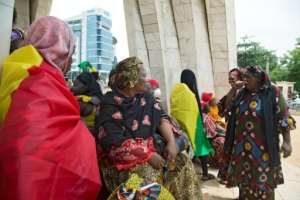 The women of the M5-RFP opposition movement, which threw its support behind Tuesday's military coup, gather at the Independence Monument in Bamako.. By ANNIE RISEMBERG (AFP)