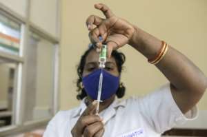 The WTO is facing calls from some countries for it to waive intellectual property rights for Covid-19 vaccines. By NOAH SEELAM (AFP)