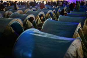 The tents were set up to protest at the destruction of other migrant camps. By MARTIN BUREAU (AFP)