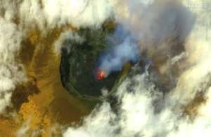 The UN says 32 people have died after the volcano erupted on Saturday. By Handout (Satellite image ©2021 Maxar Technologies/AFP)