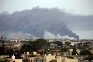 The United Nations Support Mission in Libya (UNSMIL) called the bombardment 'an all too familiar but frightening spectacle'. By Mahmud TURKIA (AFP)