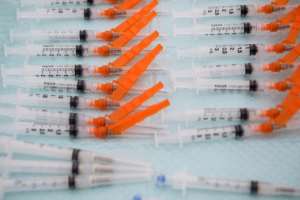 The United States vaccine drive is gathering pace, with President Joe Biden suggesting the country could be on the way to herd immunity by the summer. By Patrick T. FALLON (AFP)