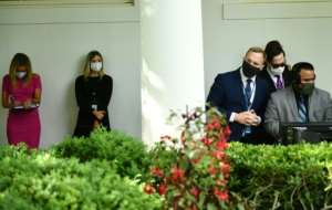 The virus appeared to have gained a foothold in the White House over the weekend, with staff told they had to wear masks at work. By Brendan Smialowski (AFP)