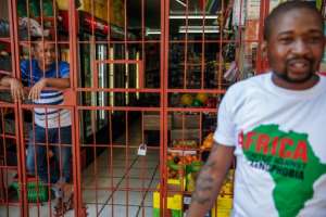 The xenophobic attacks have sparked protests and fear among foreign business owners. By Michele Spatari (AFP)