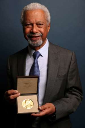 The Zanzibar-born British novelist, whose work has focused on the plight of migrants, received his Nobel prize for literature in London on Monday. By ADRIAN DENNIS (AFP)