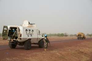 About 14,700 soldiers and police are currently deployed in Mali. By MICHELE CATTANI (AFP / File)