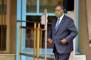 Third term? Ouattara, wearing a protective mask, at ceremonies on August 7 to mark Ivory Coast's 60th anniversary of independence. By SIA KAMBOU (AFP)