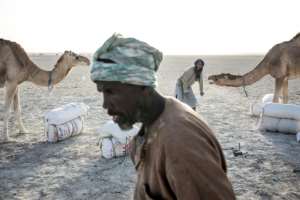 Today's traders arrive in Tichitt on a monthly supply truck, bringing rice and pasta to local shops, and leave with salt from a nearby saline field. By JOHN WESSELS (AFP)