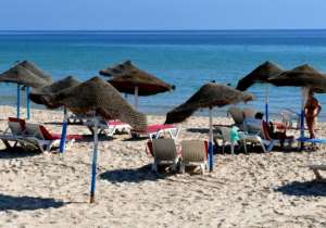 Tourists are seen along a hotel beach in Tunisia's coastal city of Sousse. By Bechir TAIEB (AFP)