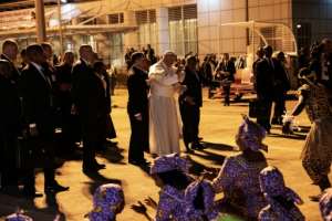 Traditional dancers greeted the pope on his his arrival at Maputo International Airport. By GIANLUIGI GUERCIA (AFP)