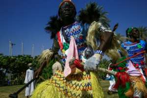 Tribal dancers perform as delegations arrive to attend a conference in Sudan's capital Khartoum. By Ashraf SHAZLY (AFP)