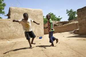 Two displaced children play in Mali, which has been wracked by an Islamist insurgency that has taken a brutal toll on the youth in the Sahel. By MICHELE CATTANI (AFP/File)