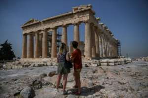 Tthe Acropolis in Athens was one of a number of famous landmarks reopened. By Aris MESSINIS (AFP)