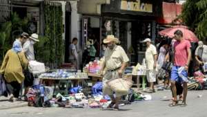 Tunisia's economy last year contracted by more than eight percent as the Covid pandemic battered the tourism-reliant economy. The dinar currency has plunged by about 50 percent over a decade, and debt has reached 100 percent of GDP. By FETHI BELAID (AFP)