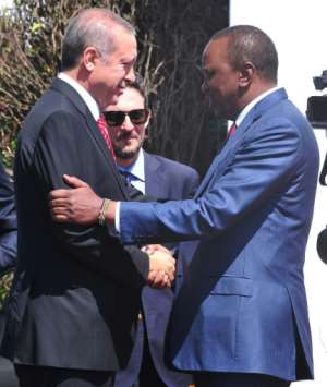 Turkish President Recep Tayyip Erdogan being welcomed by Kenyan counterpart Uhuru Kenyatta in Nairobi in 2016. By SIMON MAINA (AFP)
